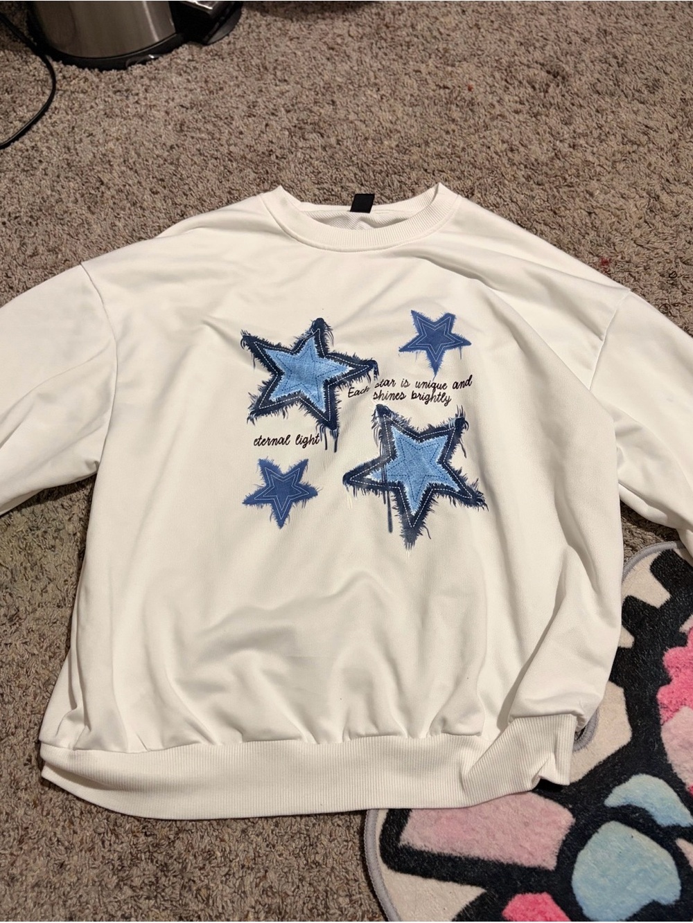 White Sweatshirt with Blue Star Appliqué